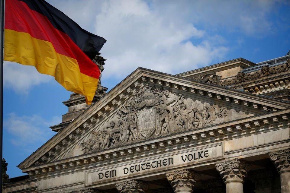 A German flag flutters in front of the Reichstag building in Berlin, Germany, September 6, 2020 (Reuters).