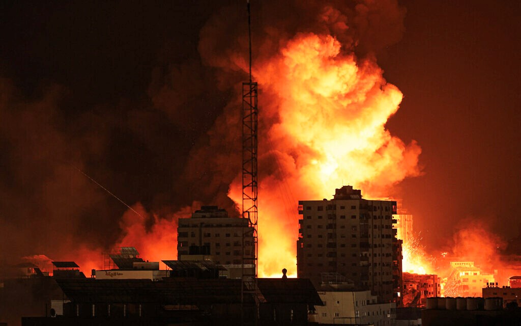 A fireball erupts during Israeli violent strikes on Gaza Strip on October 9, 2023 (AFP)