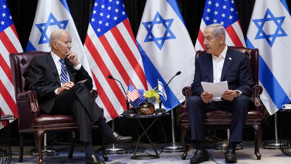 President Joe Biden and Israeli Prime Minister Benjamin Netanyahu meet with Israeli and US officials in Tel Aviv on October 18, 2023. (AP)