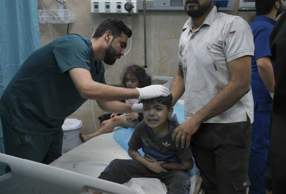 A Palestinian boy, wounded in Israeli airstrike on Gaza, Oct. 21, 2023 (AP)