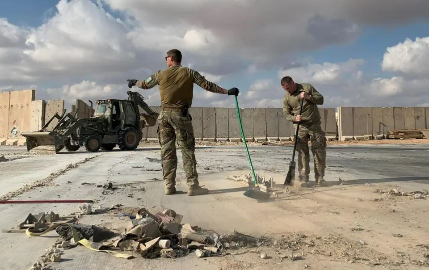 US occupation soldiers clearing rubble at Ain al-Asad military airbase in the western Iraqi province of Anbar on January 13, 2020. (AFP)