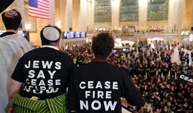 Demonstrators call for a ceasefire during a protest organized by Jewish Voice for Peace at Grand Central Station in New York City on October 27, 2023. (AFP)