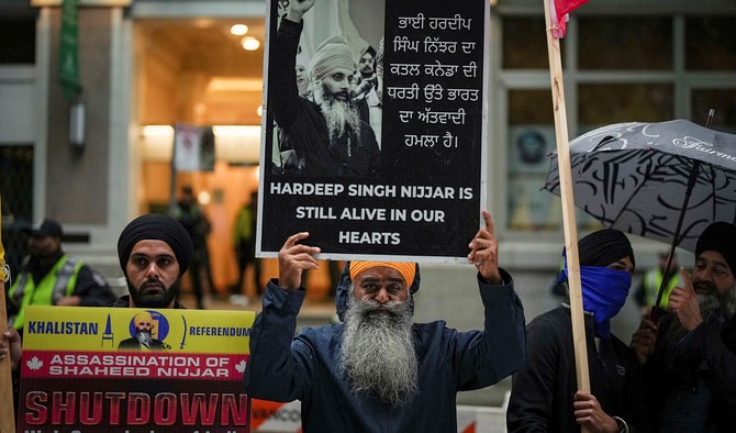 People protest outside the Indian Consulate, in Vancouver, British Columbia, on September 25, 2023. (AP)