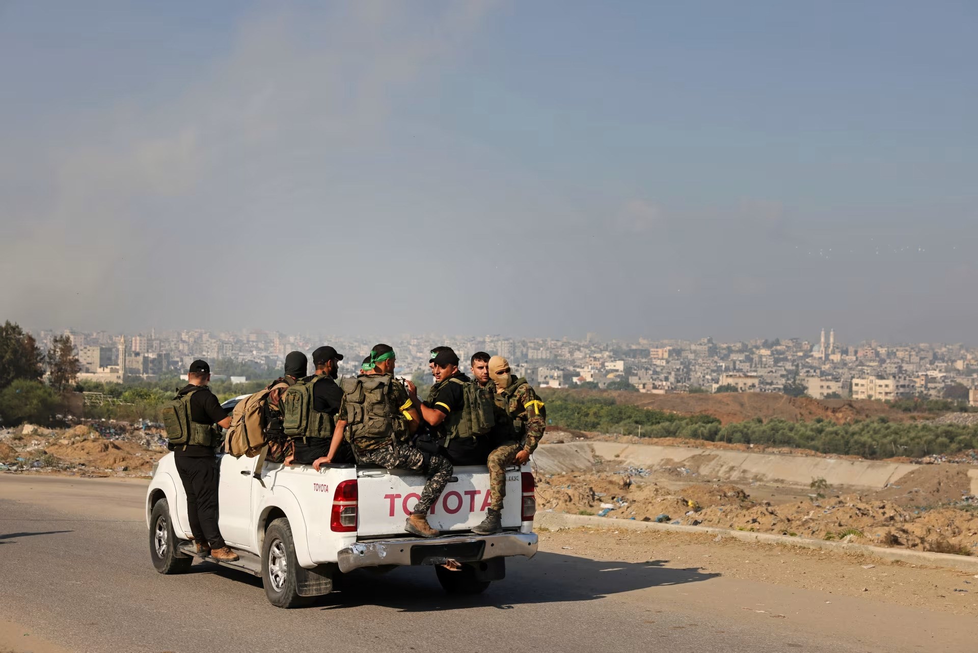 Palestinian Resistance fighters advancing toward the Israeli Erez checkpoint at the separation fence, October 7, 2023. (AFP via Getty Images)