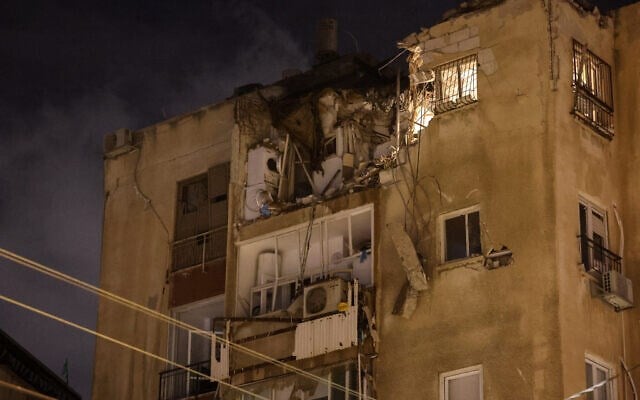 •A building in “Tel Aviv” damaged by rocket fire from the Gaza Strip on October 7, 2023. (AFP)