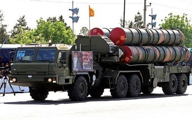 An Iranian military truck carries parts of the S-300 air defense missile system during a parade on the occasion of the country's Army Day, on April 18, 2017, in Tehran. (AFP)