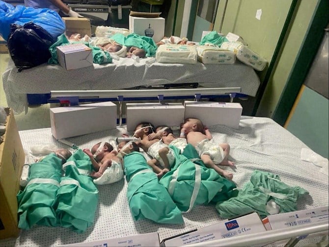 Footage shared by the Gaza Ministry of Health reveals multiple premature babies, previously removed from their incubators at the hospital, now huddled together and placed in a single bed.