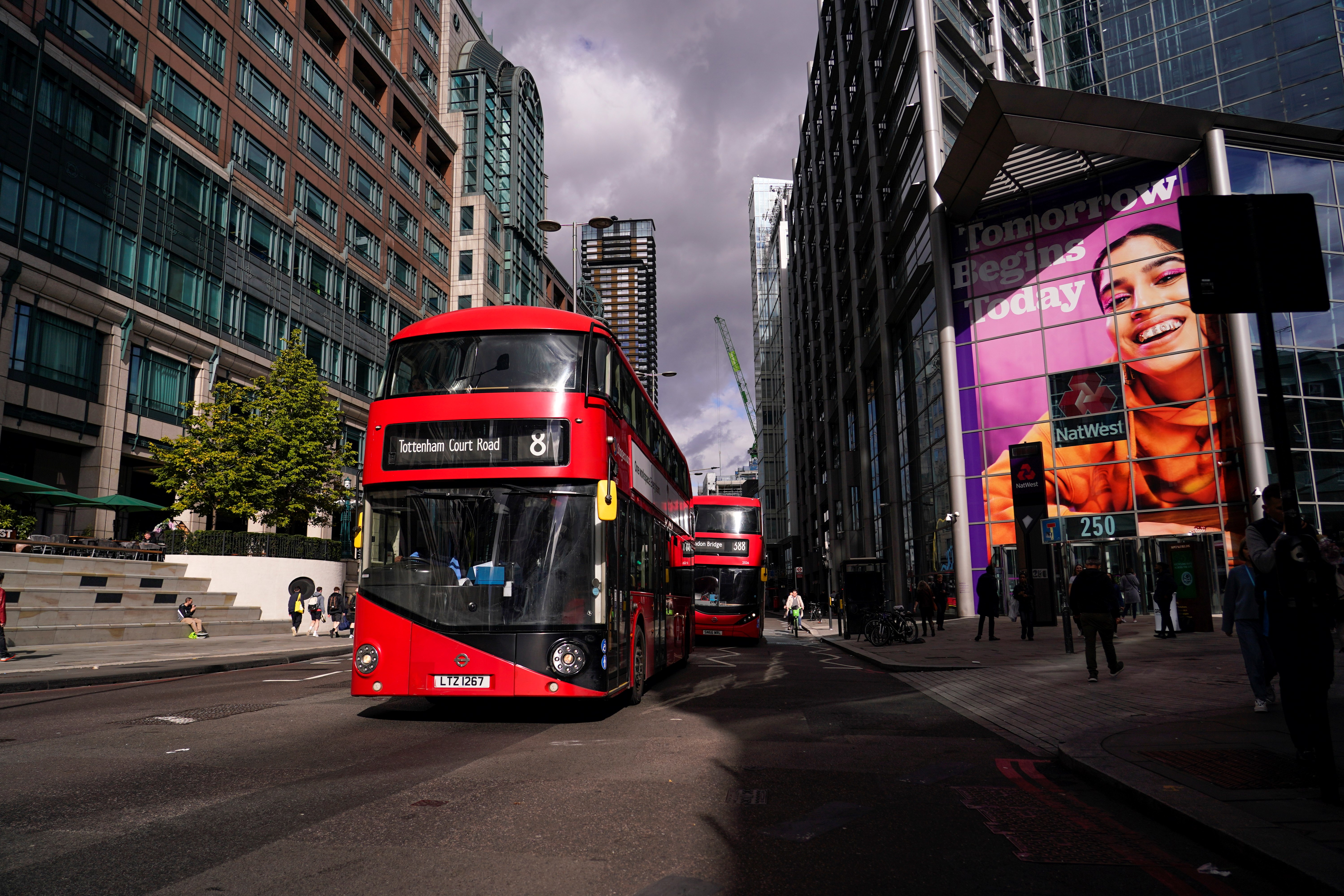 Buses drive past Liverpool Street station, in the financial district known as The City, in London, Friday, Oct. 7, 2022  (AP Photo/Alberto Pezzali)
