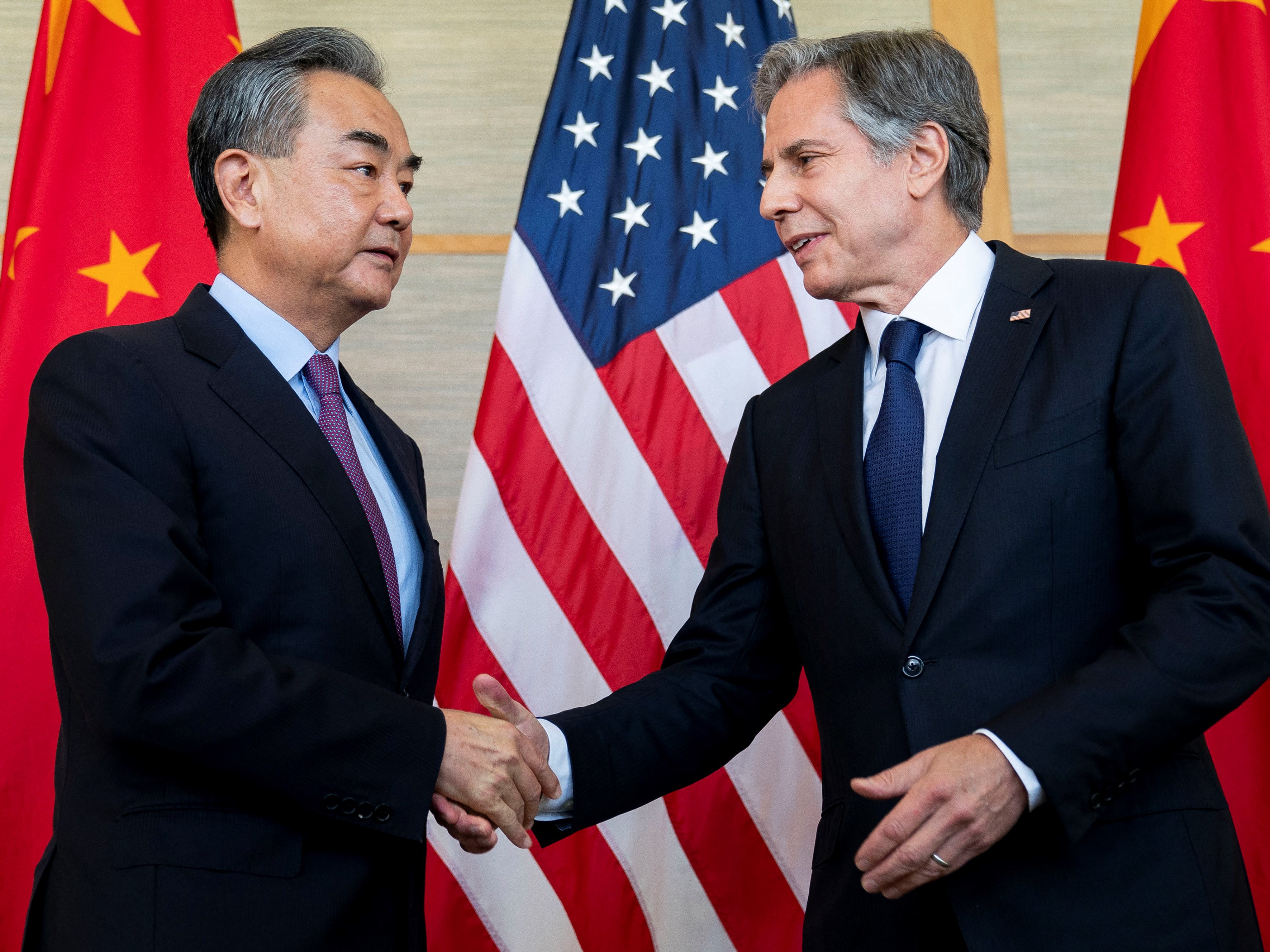 Chinese diplomat Wang Yi with US Secretary of State Antony Blinken in Bali on July 9, 2022 (AFP)