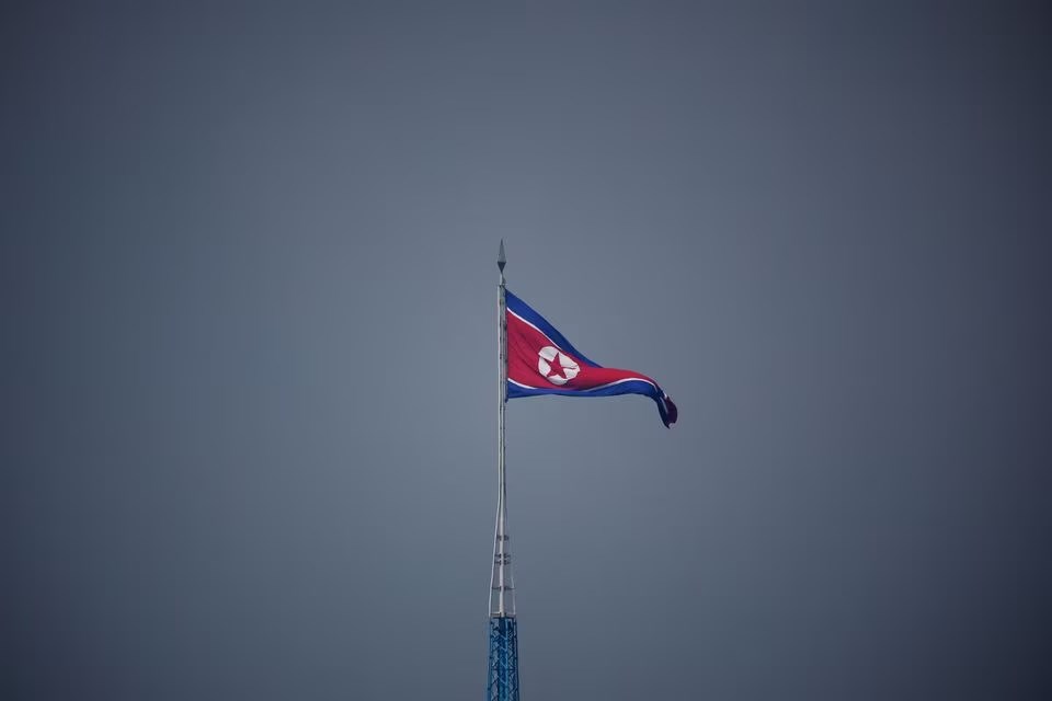 A North Korean flag flutters at the propaganda village of Gijungdong in North Korea, July 19, 2022. (Reuters)/