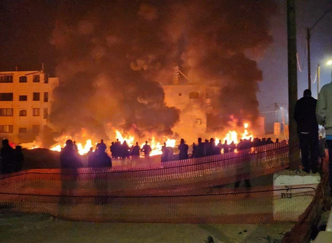 Israeli settlers attack Huwara in Nablus setting houses on fire