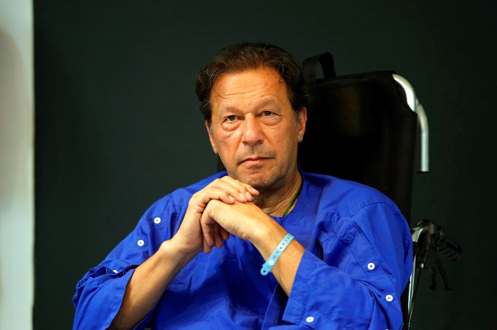 Former Pakistani Prime Minister Imran Khan speaks during a news conference in Shaukat Khanum hospital, where is being treated for a gunshot wound in Lahore, Pakistan, on Nov. 4, 2022 (AP Photo/K.M. Chaudhry)