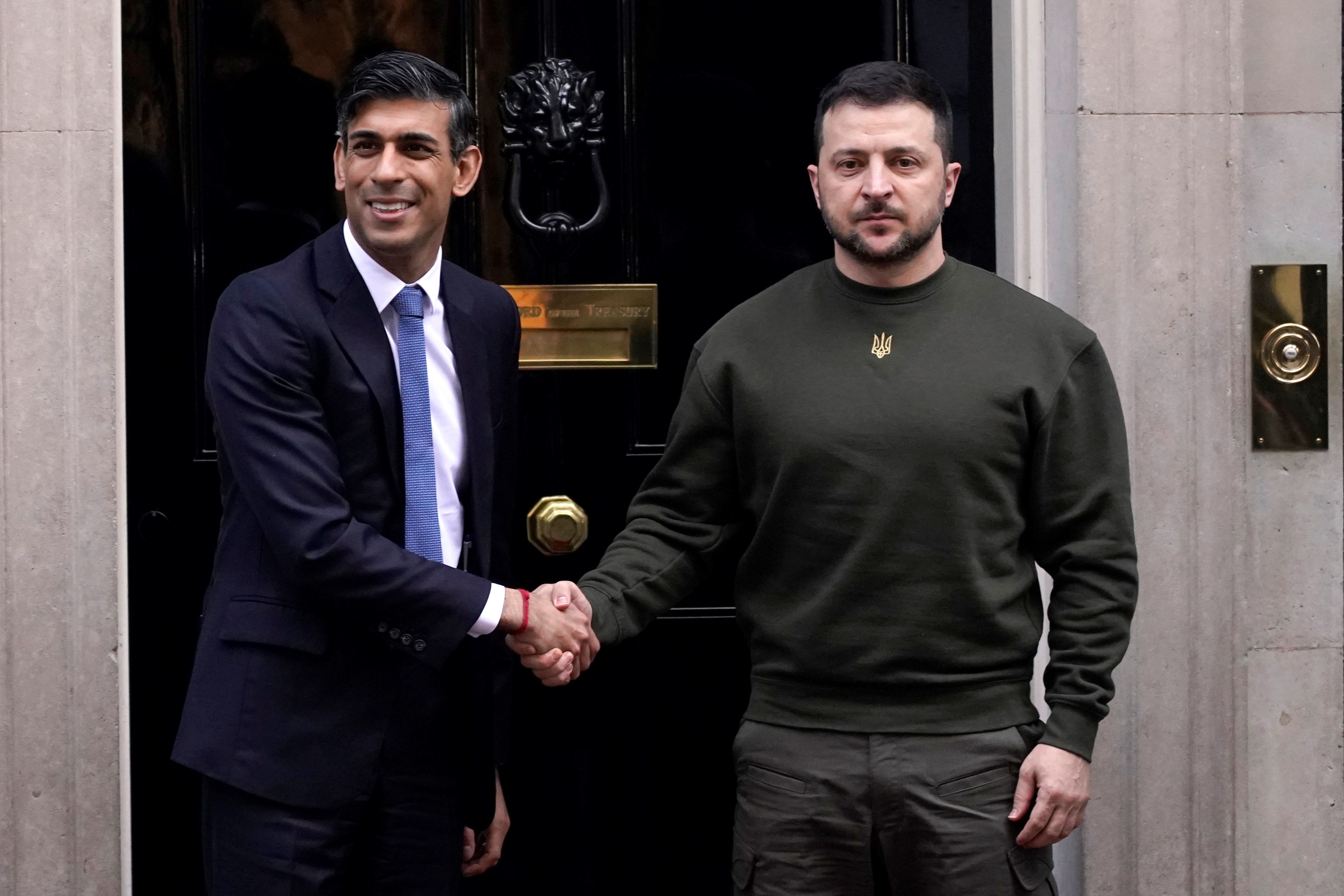 Britain's Prime Minister Rishi Sunak, left, welcomes Ukraine's President Volodymyr Zelenskyy at Downing Street in London, Wednesday, Feb. 8, 2023 (AP Photo/Alberto Pezzali)