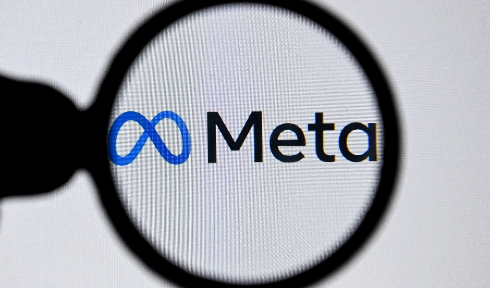 This photograph taken on October 28, 2021 shows the META logo on a laptop screen in Moscow. ( AFP
