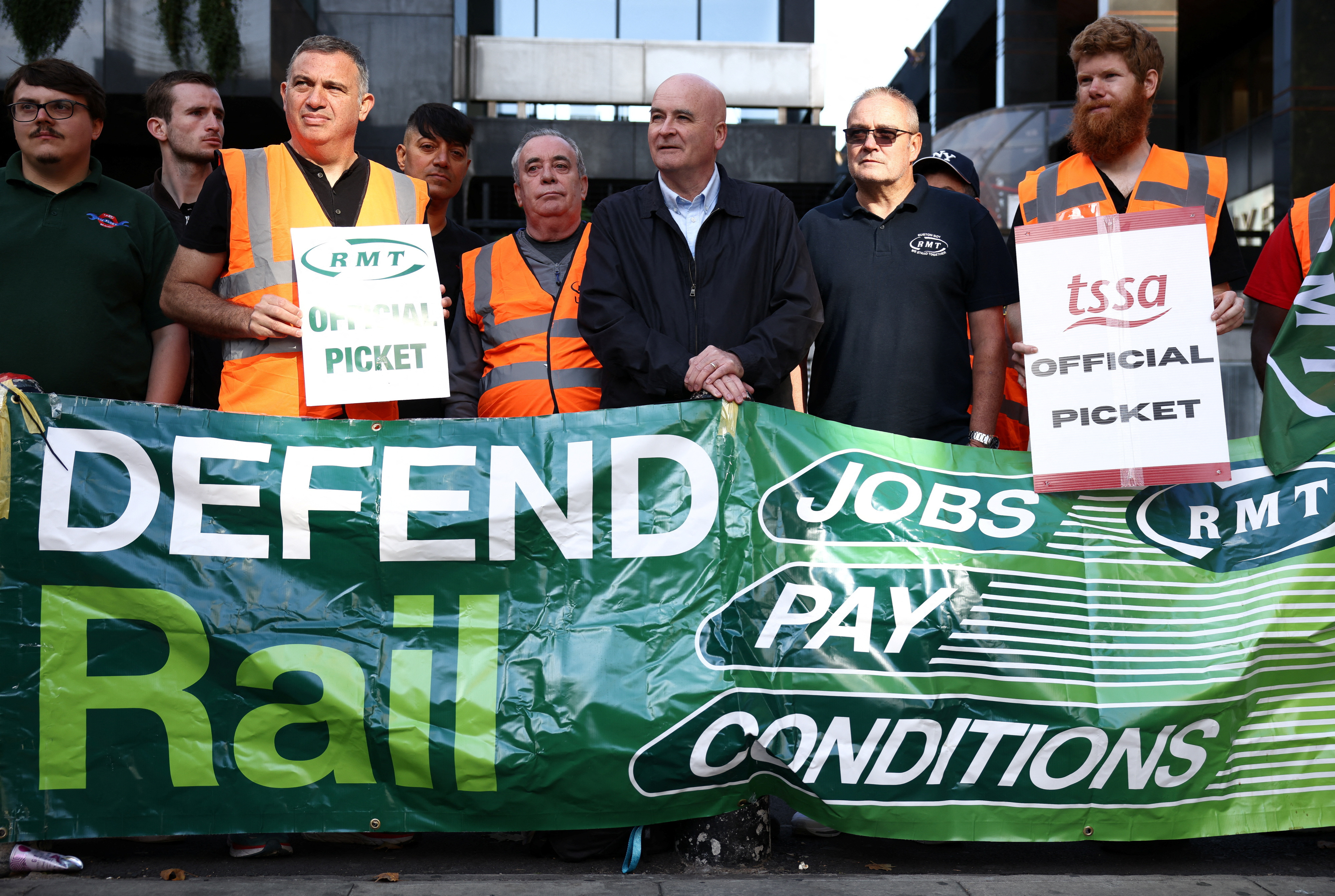 Mick Lynch, General Secretary of the National Union of Rail, Maritime and Transport Workers joins other union members on strike at a picket line outside Euston railway station in London, Britain, August 20, 2022 (Reuters).