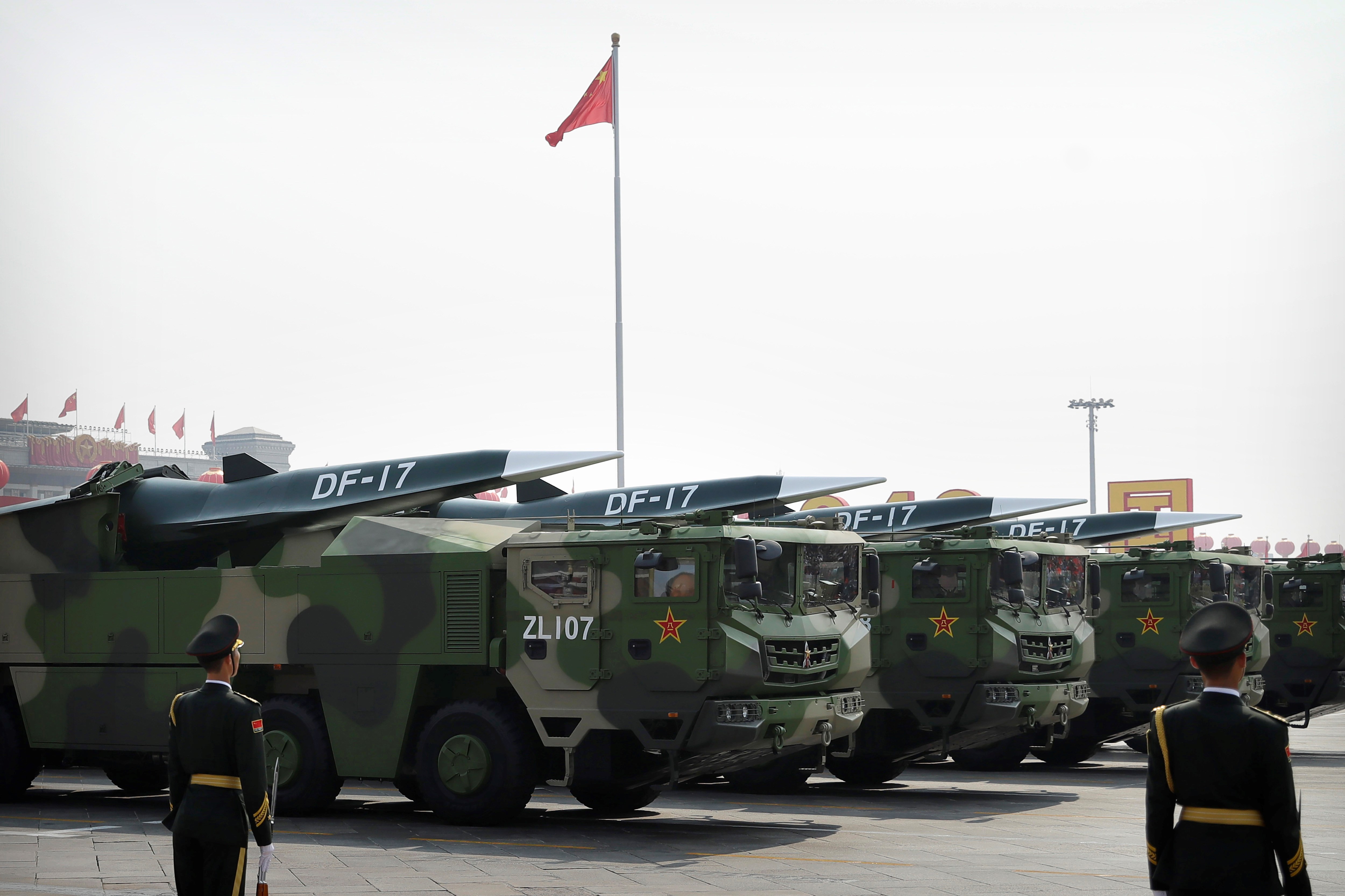 Chinese military vehicles carrying DF-17 ballistic missiles roll during a parade to commemorate the 70th anniversary of the founding of Communist China in Beijing, Tuesday, Oct. 1, 2019 (AP Photo/Mark Schiefelbein)