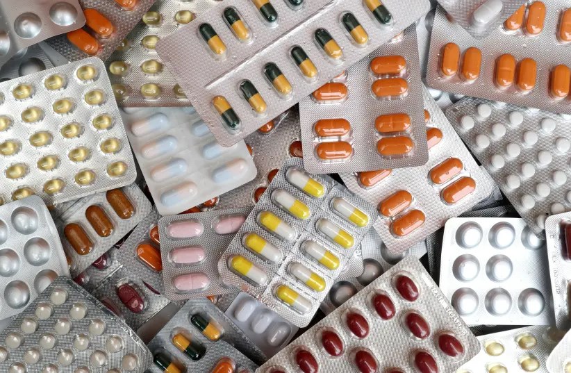 Illustrative photo shows various medicine pills in their original packaging. (Reuters)
