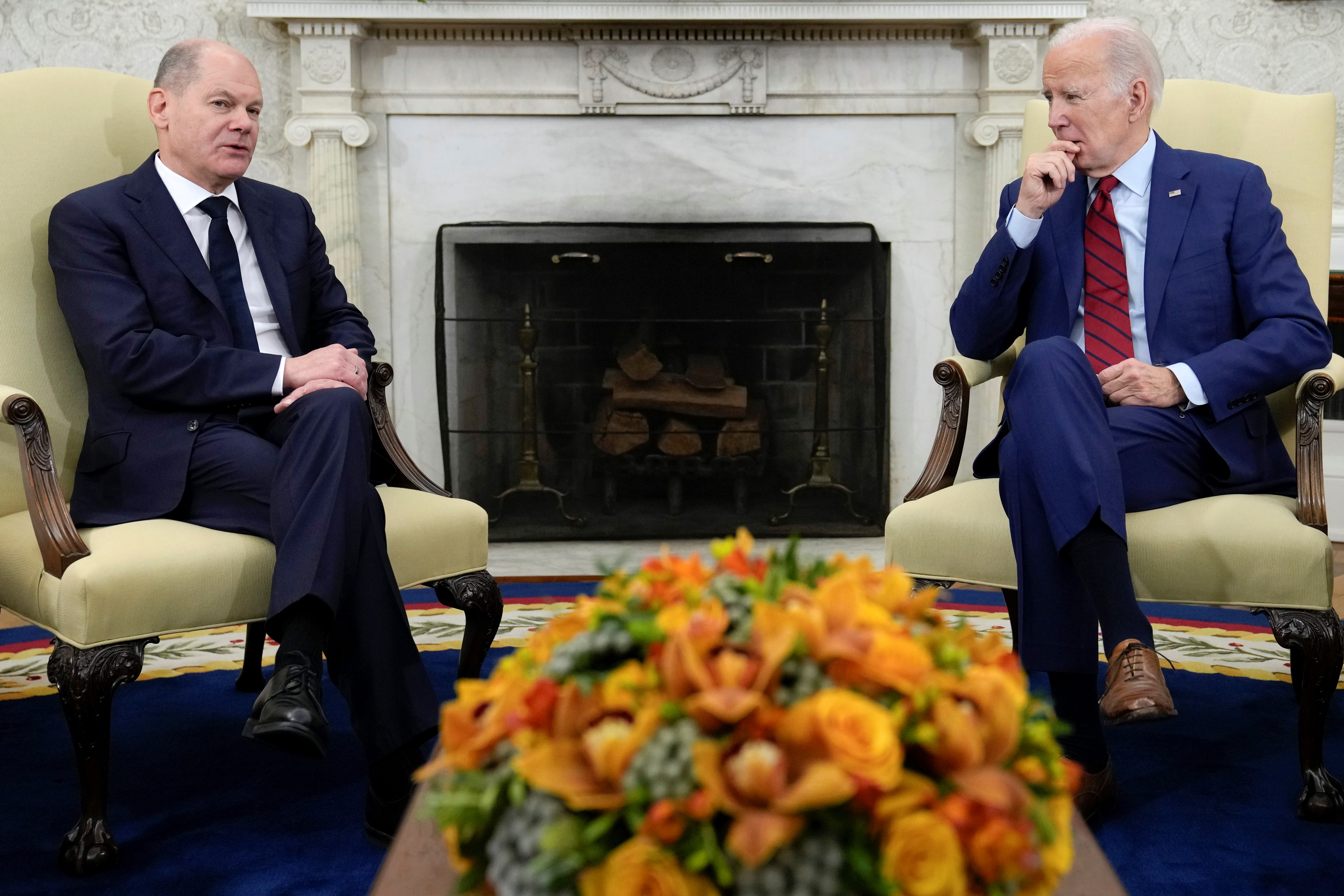 President Joe Biden listens as German Chancellor Olaf Scholz speaks during a meeting in the Oval Office of the White House in Washington, Friday, March 3, 2023 (AP).