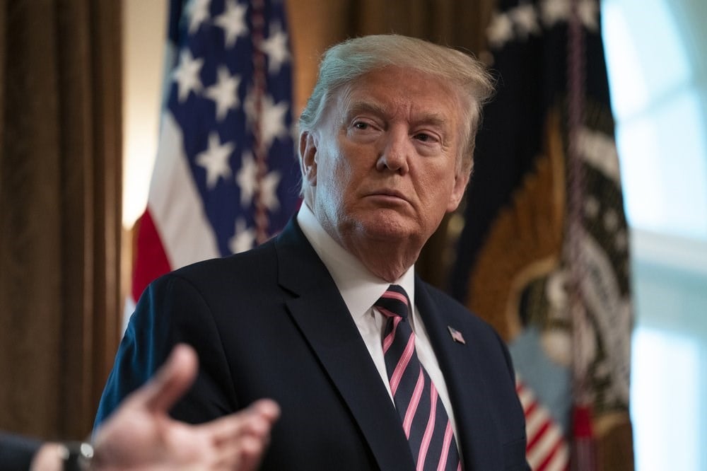 President Donald Trump listens during a demonstration of ways NASA is helping to combat the coronavirus, in the Cabinet Room of the White House, Friday, April 24, 2020, in Washington. (AP)