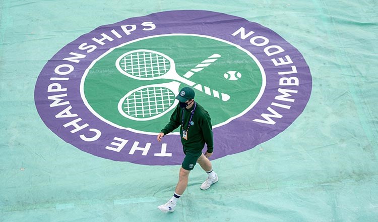 A logo is pictured on a court cover of the 5th day of the 2021 Wimbledon Chanpionships in Wimbledon, southwest London, UK. (AFP)