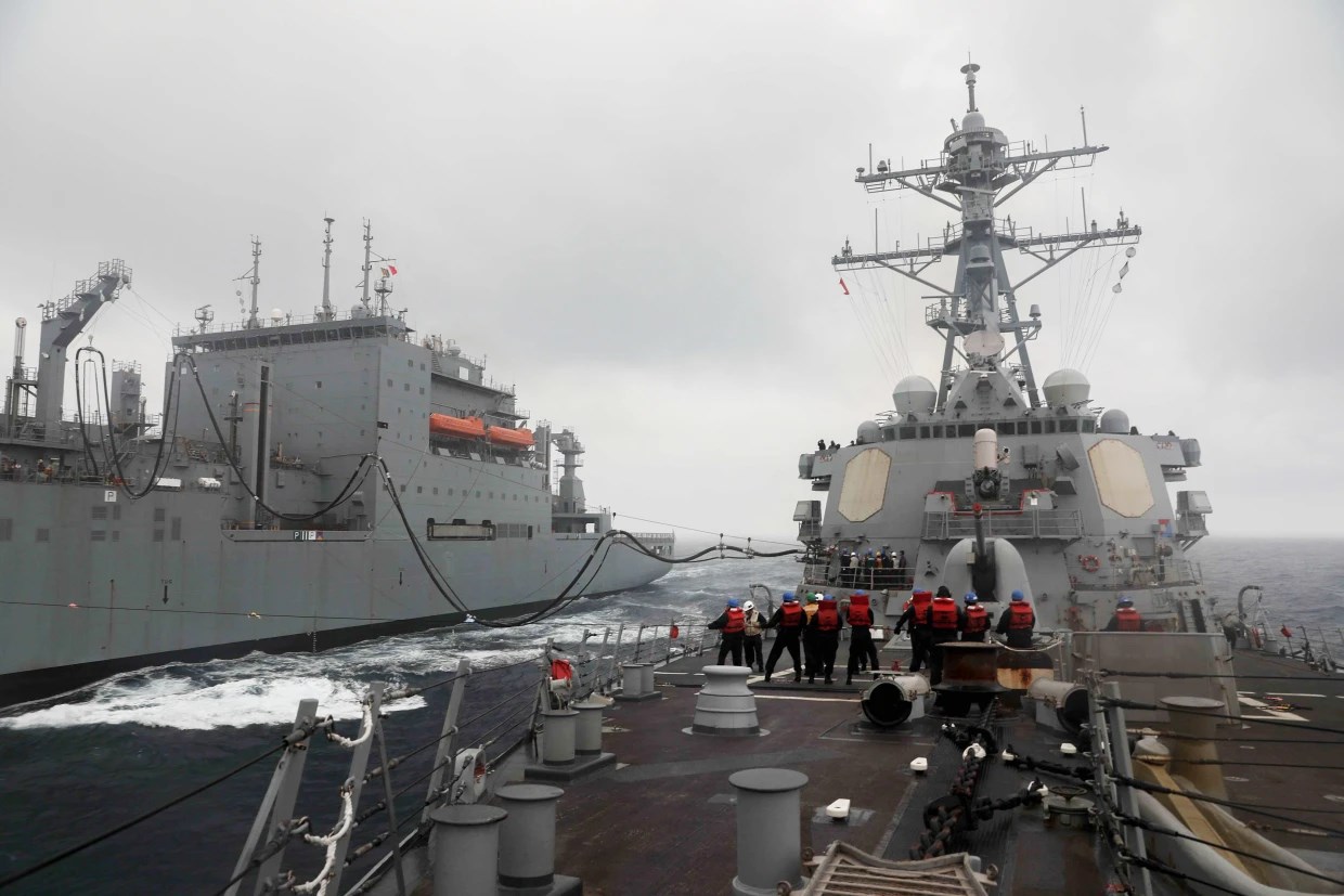 =Sailors on the USS Milius conducting an operation in the East China Sea on March 23,2023 (US7thfleet / Twitter)