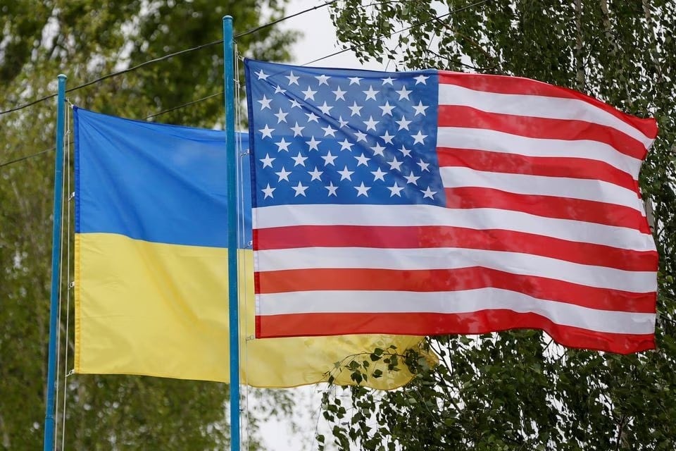US and Ukrainian flags fly at a compound for police training outside Kiev, Ukraine, 6 May 2016. (Reuters)