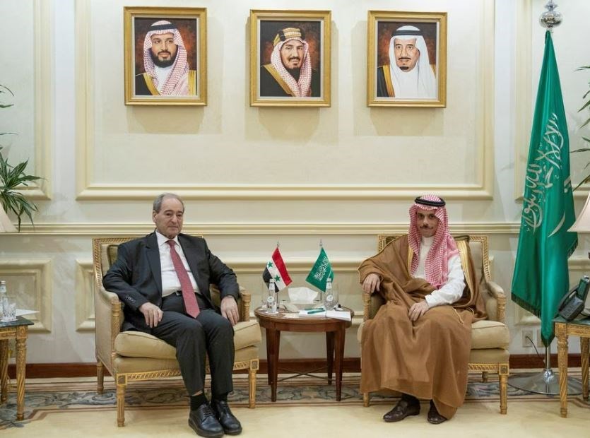 Saudi Foreign Minister Prince Faisal bin Farhan bin Abdullah meets with Syrian Minister of Foreign Affairs and Expatriates Faisal Mekdad in Jeddah, Saudi Arabia, April 12, 2023. (Reuters)