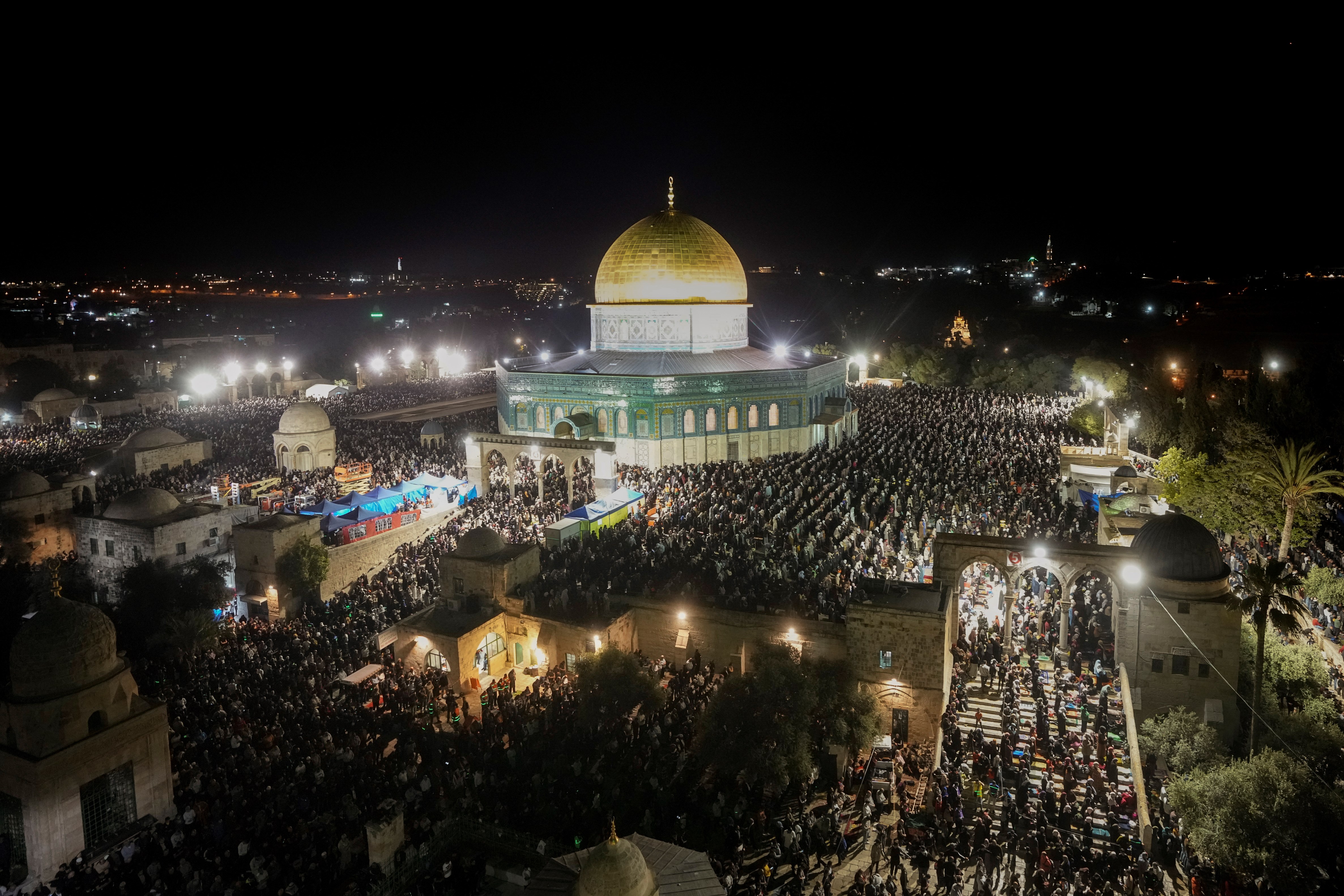 Palestinian Muslim worshippers pray during Laylat Al Qadr, in front of the Al-Qibli Mosque, in the Al-Aqsa Mosque compound in the Old City of occupied Al-Quds, Monday, April 17, 2023. (AP)