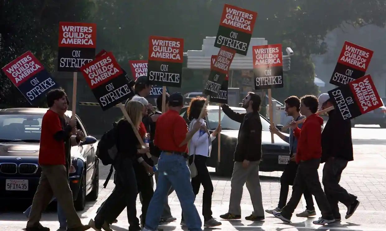 In this 2007 photo, members of the Writers Guild of America walk a picket line at Sony Studios in Culver City. (REUTERS)
