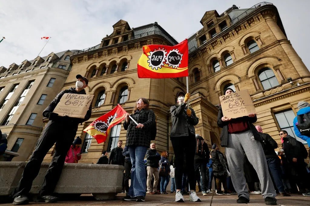 Striking public workers demonstrate outside of the Prime Minister’s office in Ottawa, Canada, 19 April 2023. (Reuters)