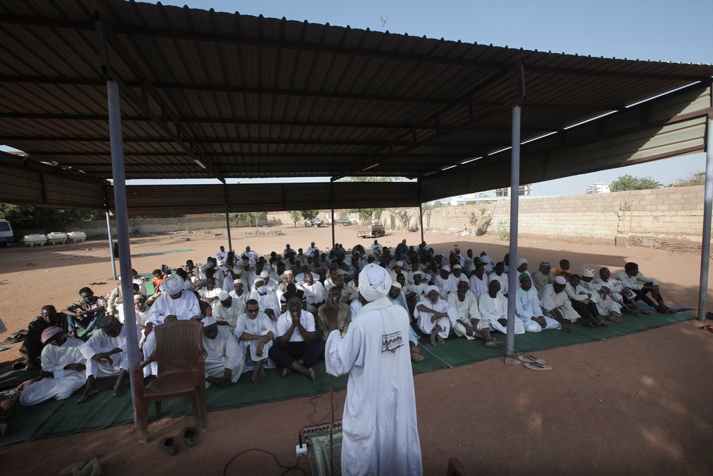 People attend Eid al-Firtr prayer in Khartoum, Sudan, Friday, April 21, 2023 (AP Photo/Marwan Ali)