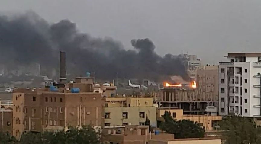 Smoke rises from the tarmac of Khartoum International Airport as a fire burns, in Khartoum, Sudan April 17, 2023. (REUTERS)
