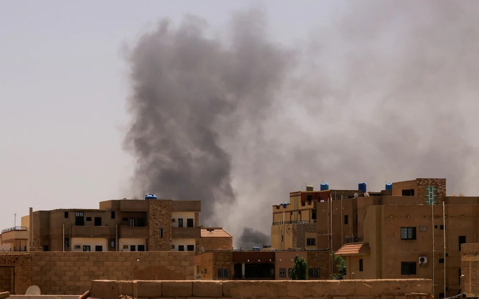 Smoke comes out of a building in Khartoum following clashes between rival generals   (Reuters)