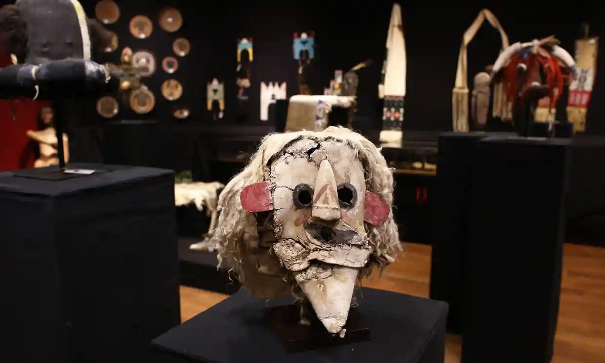 A Puebloan Kachina Huhuwa mask displayed for sale among other Native American artifacts at a 2014 Paris auction, France. (AFP)