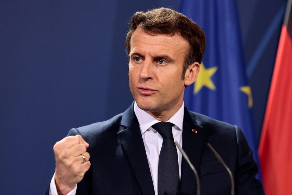 French President Emmanuel Macron speaks to the media ahead of a Weimar Triangle meeting to discuss the ongoing Ukraine crisis, in Berlin, Germany, February 8, 2022. (REUTERS)