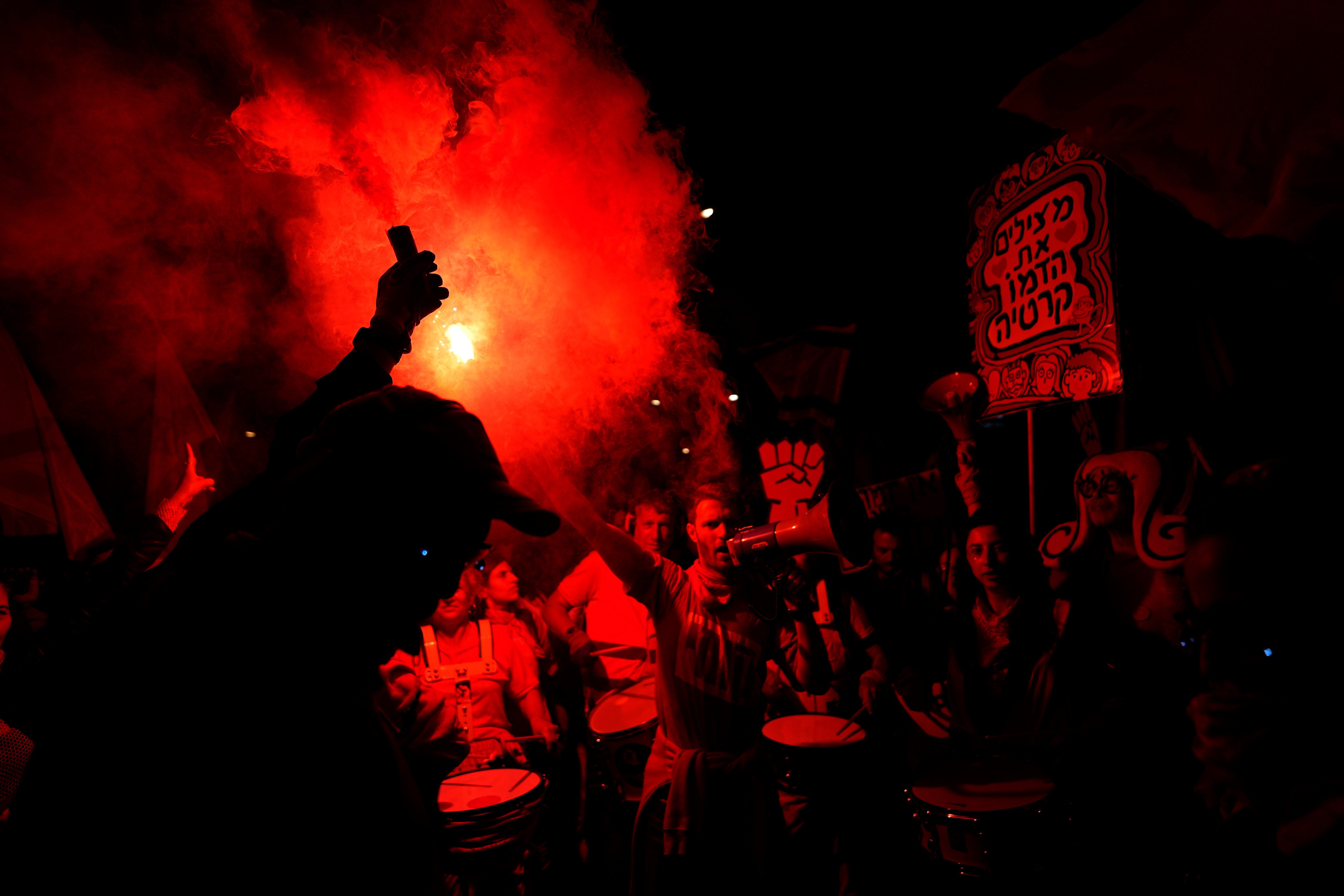 Israelis protest plans by Prime Minister Benjamin Netanyahu's government to overhaul the judicial system, in Tel Aviv, Israel, Saturday, April 1, 2023. (AP)