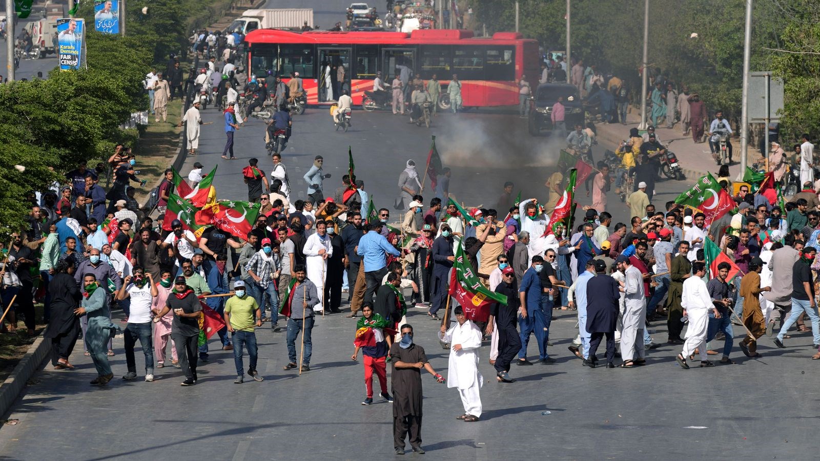 Clashes between Khan's supporters and police in Karachi, Pakistan (AP)