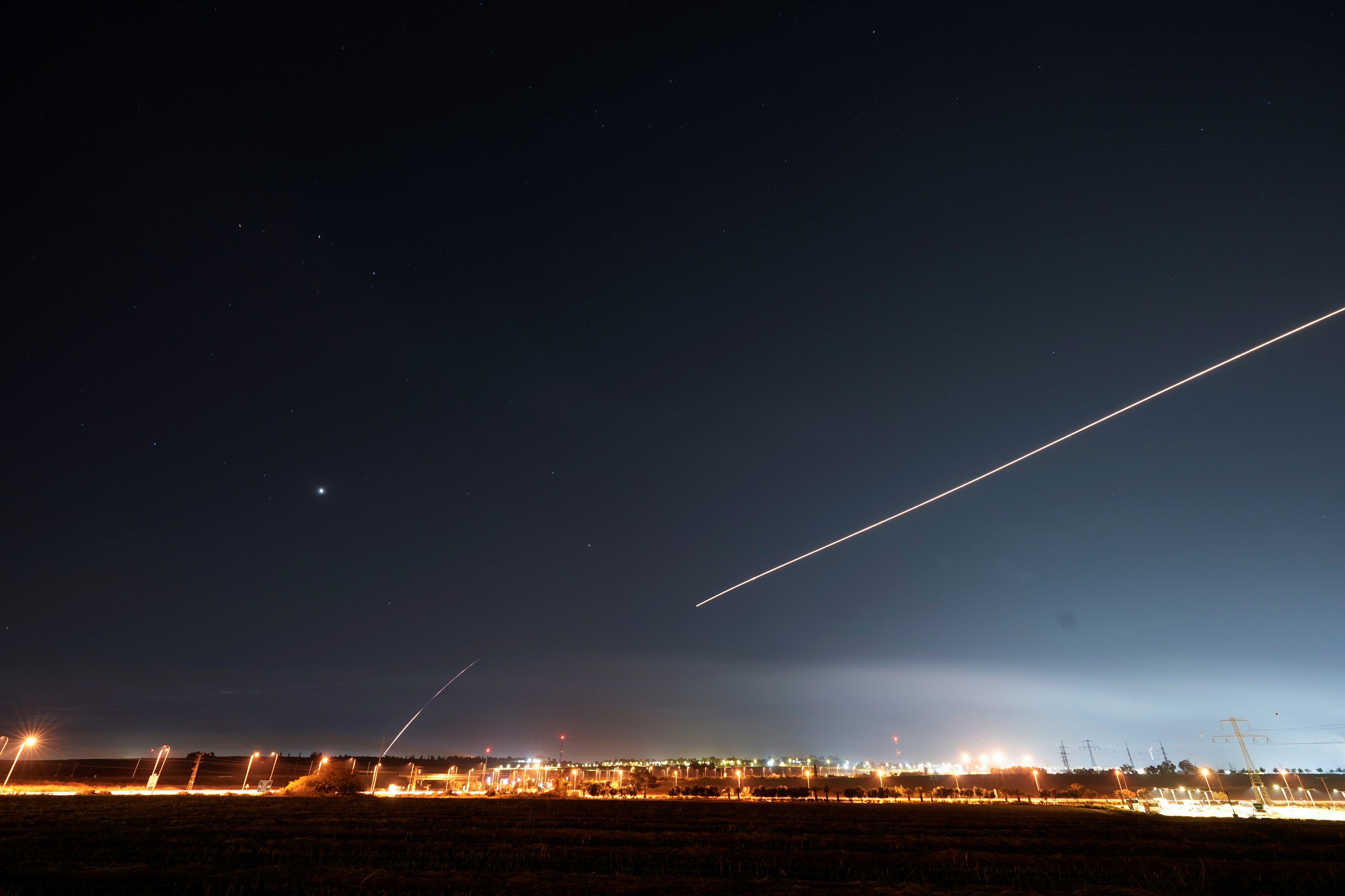 Israeli Iron Dome anti-missile system fires to intercept a rocket launched from the Gaza Strip towards Occupied Palestinian territories, near Sderot Settlement, Gaza envelope, Occupied Palestine, Wednesday, May 10, 2023. (AP)