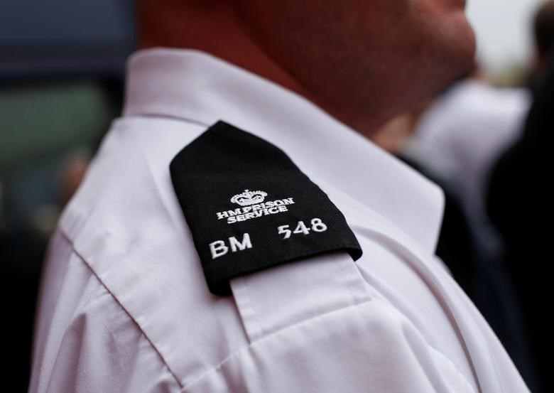  Prison officers attend a meeting outside Birmingham prison in central England on April 1, 2011 (Reuters)