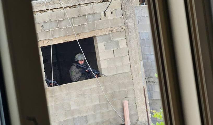 IOF snipper positioned on top of a building in Balata Camp, West Bank, Occupied Palestine 13 May, 2023. (Social Media)