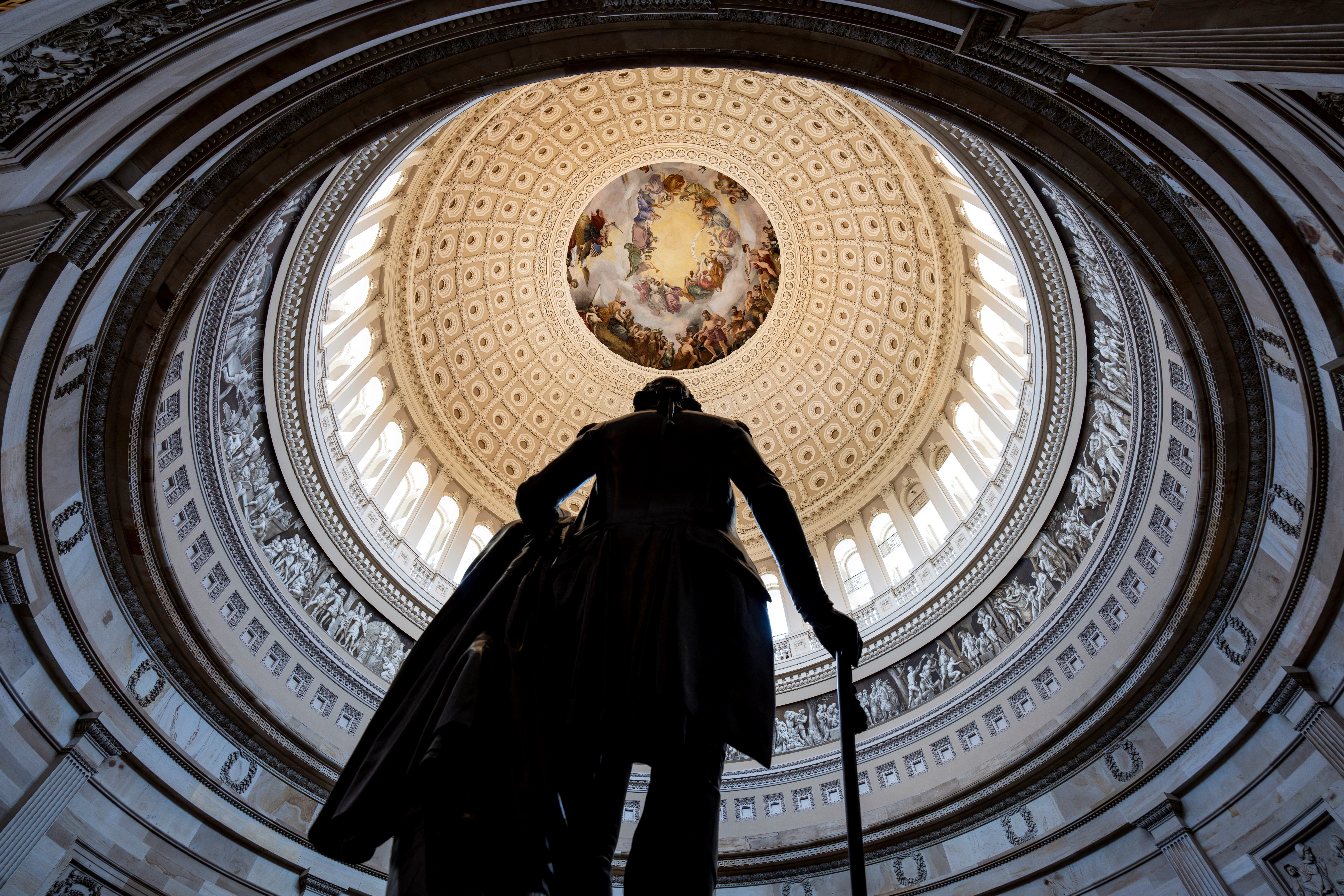 The Rotunda of the U.S. Capitol Building is seen with a statue of George Washington in the foreground, in Washington, Wednesday, May 17, 2023. (AP)