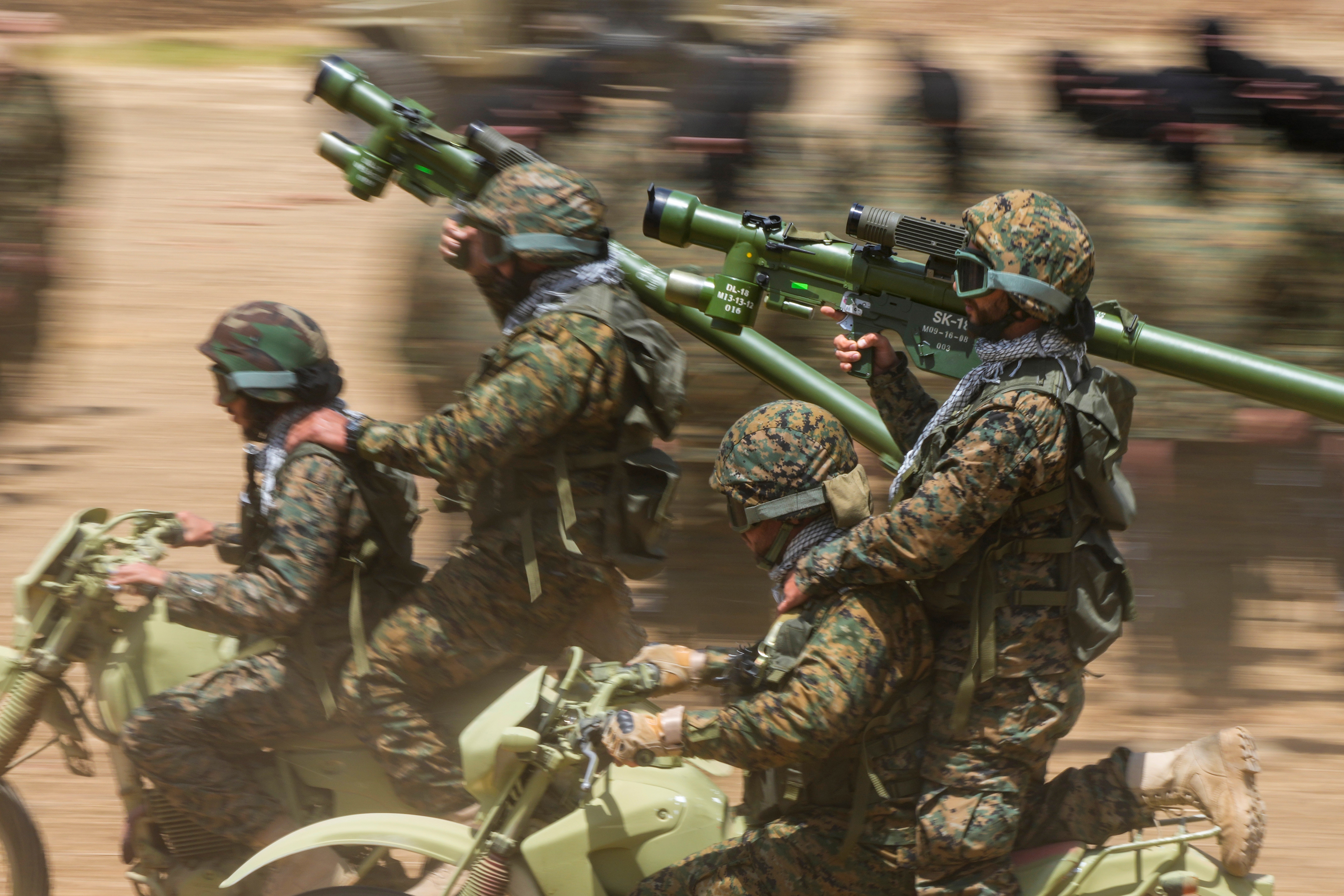 Fighters from the Lebanese Hezbollah carry out a training exercise in Aaramta village in the Jezzine District, southern Lebanon, Sunday, May 21, 2023 (AP Photo/Hassan Ammar)