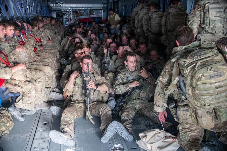 UK military members board an A400M aircraft after the US and its allies hastily exited Afghanistan, 28 August 2021. (Reuters)