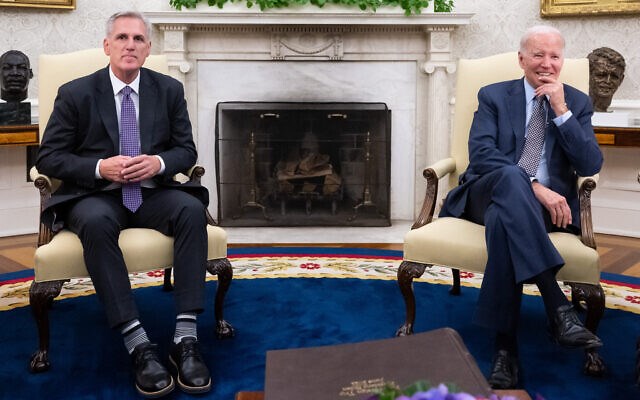 US President Joe Biden meets with US House Speaker Kevin McCarthy (R-CA) (L) about the debt ceiling, in the Oval Office of the White House in Washington, DC, on May 22, 2023. (AFP)