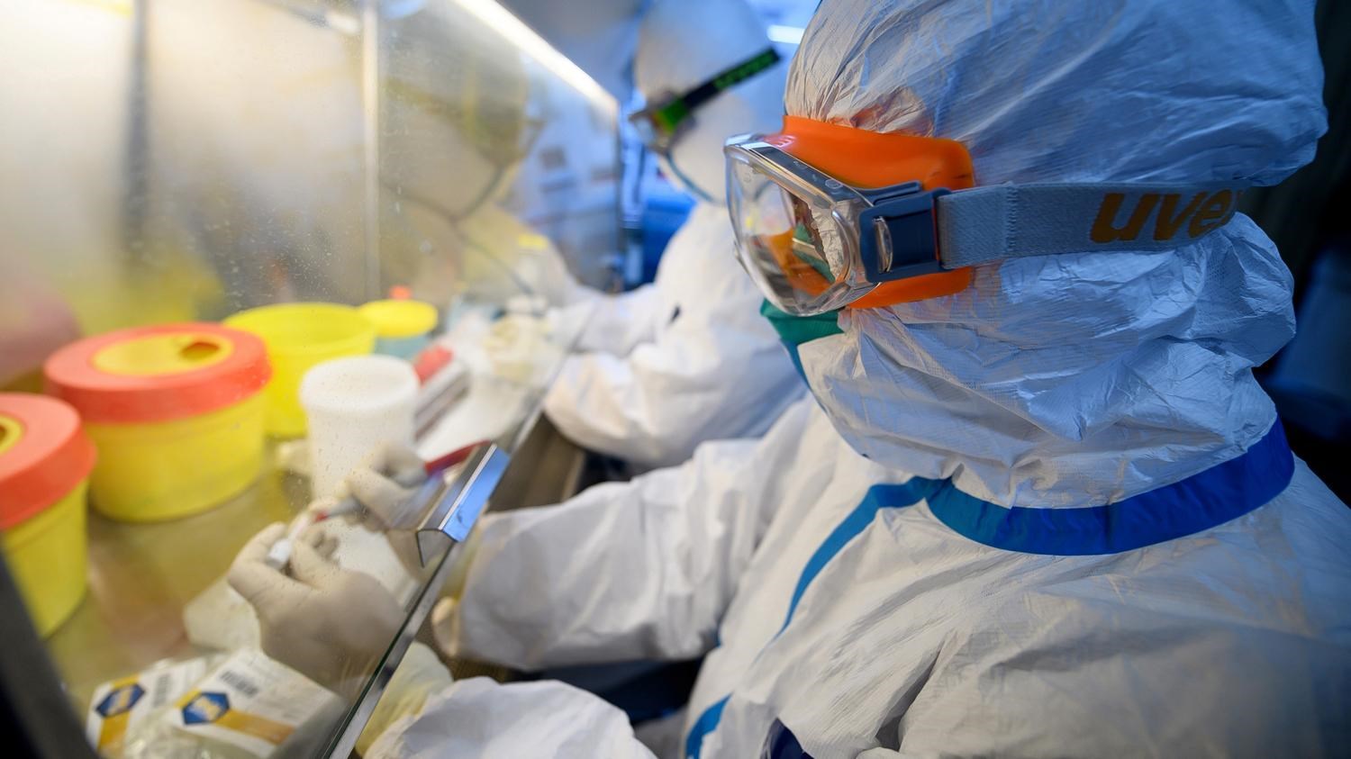 Chinese scientists in a laboratory in Beijing, China (Reuters)