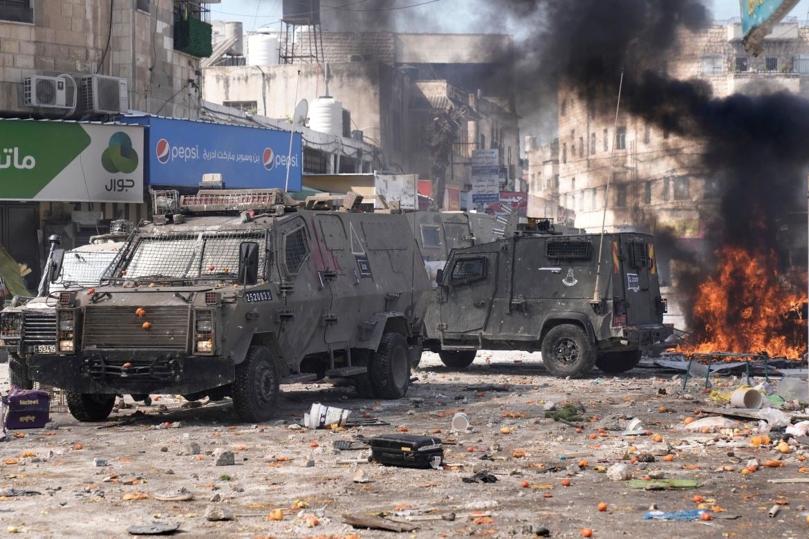 Israeli occupation forces during a raid on Nablus in 2023 (AP)