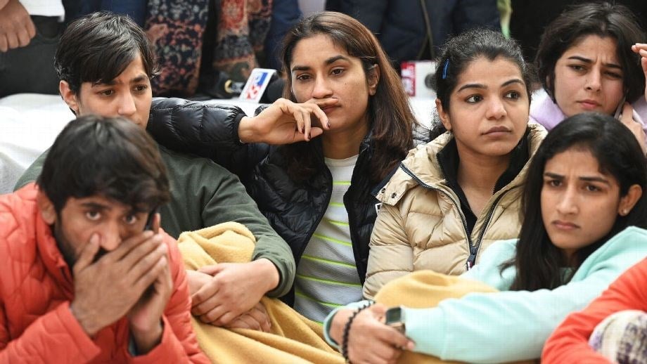 Bajrang Punia, Vinesh Phogat, and Sakshi Malik protest against the authorities who are covering up an alleged sexual harrasment complaint against the Wrestling Federation of India (WFI), Dehli, India. (AFP)