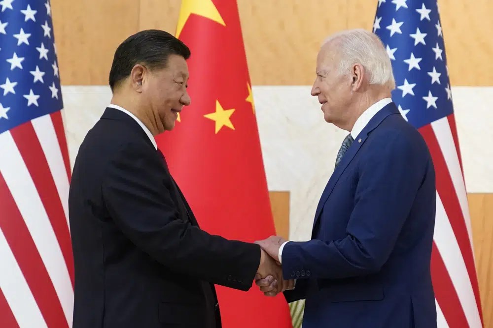 US President Joe Biden, right, and Chinese President Xi Jinping shake hands before their meeting on the sidelines of the G20 summit meeting, Nov. 14, 2022, in Nusa Dua, in Bali, Indonesia. (AP)
