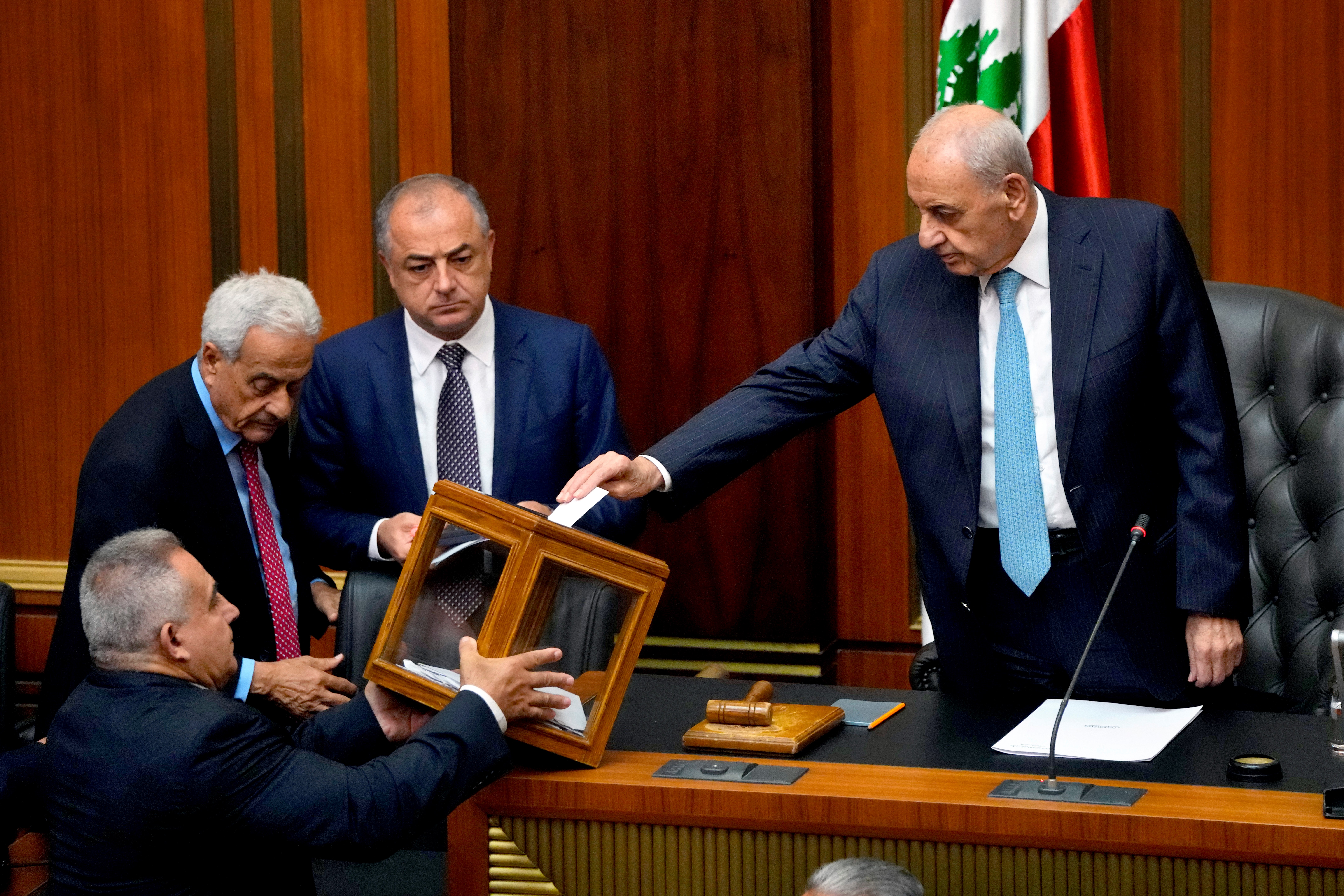 Lebanese Parliament Speaker Nabih Berri, right, casts his vote as parliament gathers to elect a president at the parliament building in downtown Beirut, Lebanon, Wednesday, June 14, 2023 (AP Photo/Hassan Ammar)