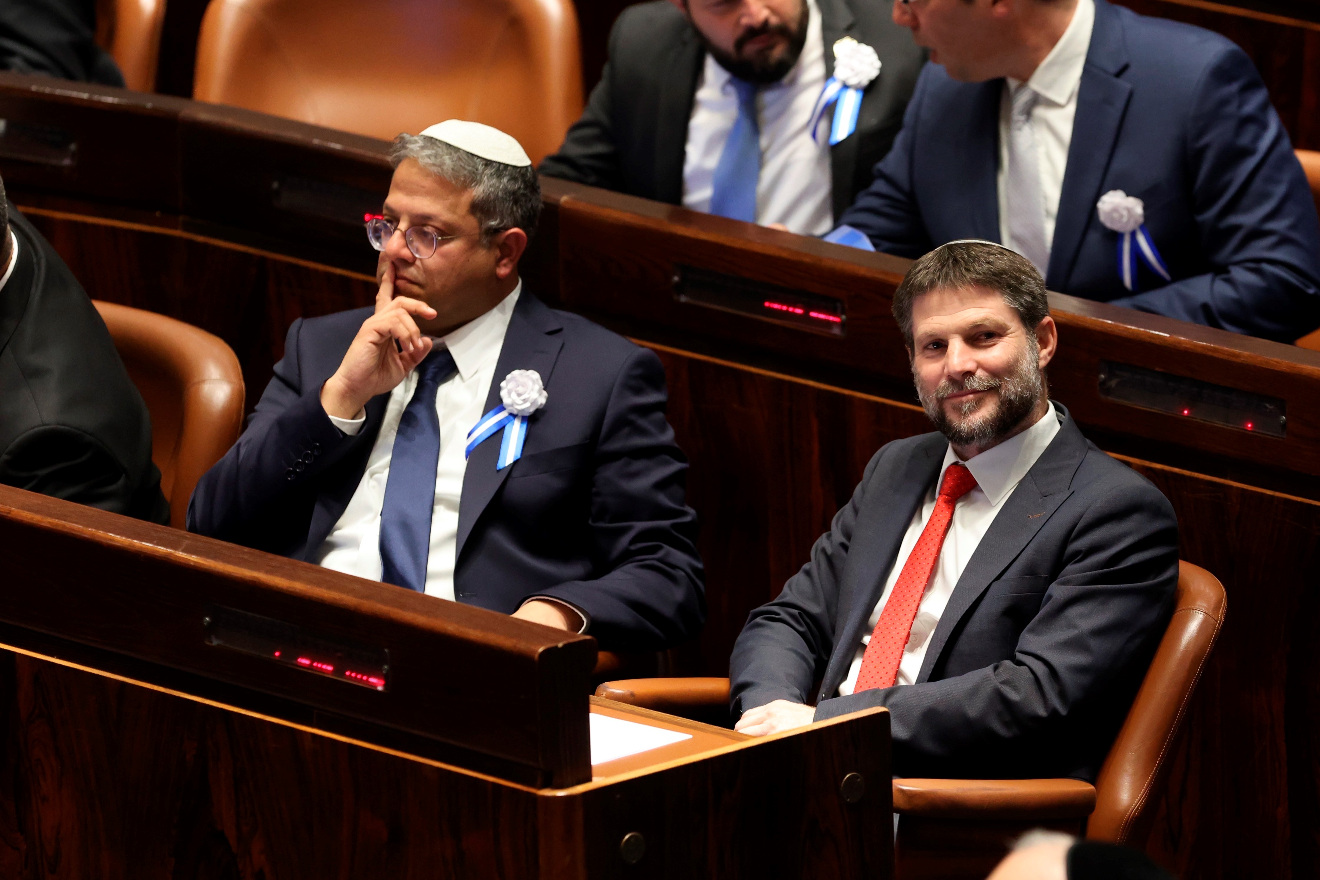 aafhoseogjsIsraeli right-wing Knesset member Itamar Ben-Gvir (left) and Bezalel Smotrich look on during the swearing-in ceremony for Israeli lawmakers at the Knesset, Israel's parliament, in Jerusalem in November 2022 (AP)